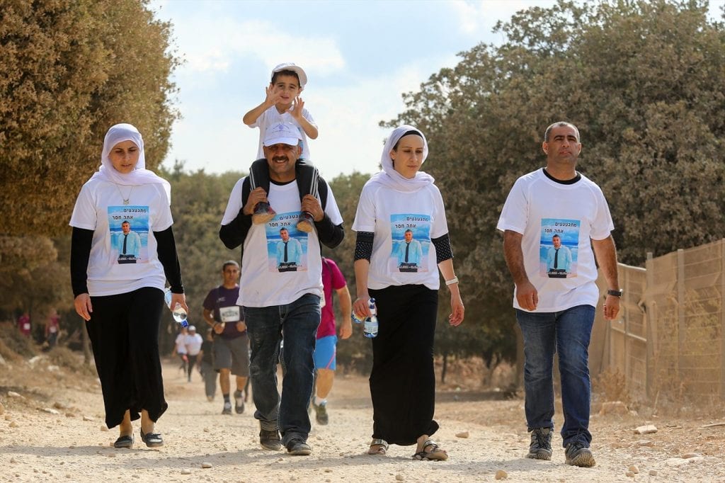A Druze family honors its fallen IDF soldier at the memorial run. (Courtesy LIBI)
