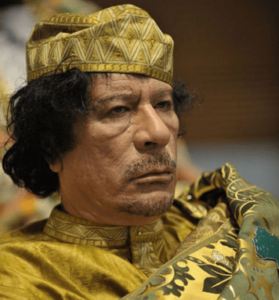 Former Libyan dictator Muammar al-Gaddafi. (Photo: U.S. Navy photo by Mass Communication Specialist 2nd Class Jesse B. Awalt via Wikimedia Commons)