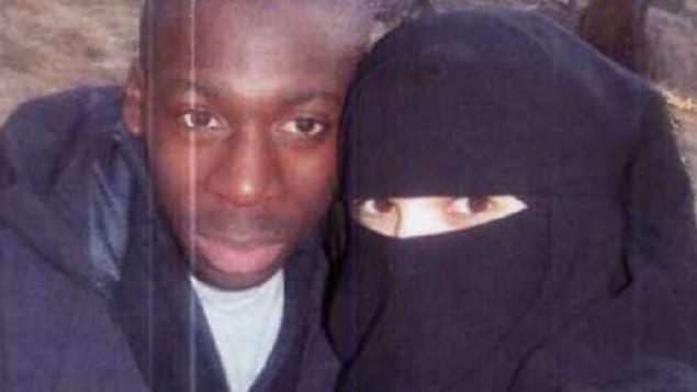 Amedy Coulibaly with his wife in an undated photo. (Photo: Screenshot/ Itele)