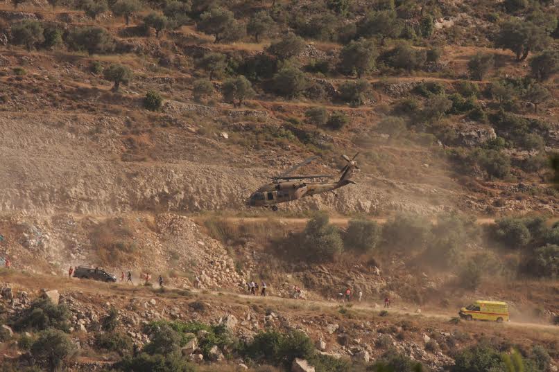 An IDF helicopter seen evacuating Danny Gonen and his friend near Dolev following the terror attack. (Photo: Yedidiah Ariel/ Tazpit News Agency)