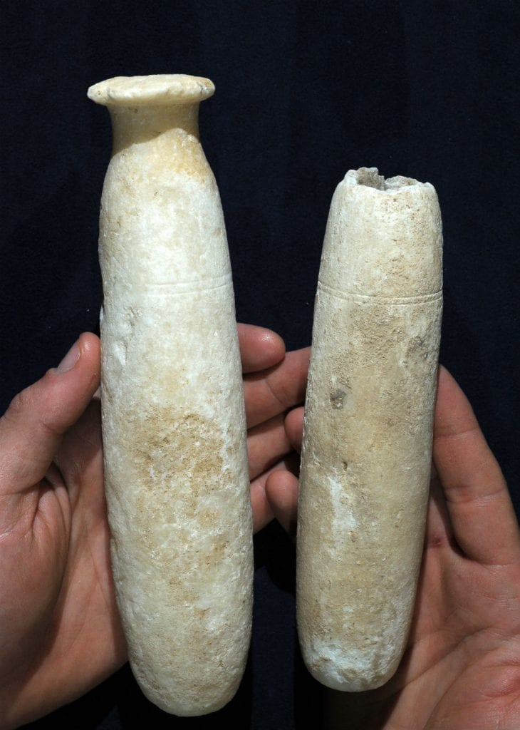Alabaster bottles that were discovered in the cave. (Photo: Clara Amit/ Israel Antiquities Authority)