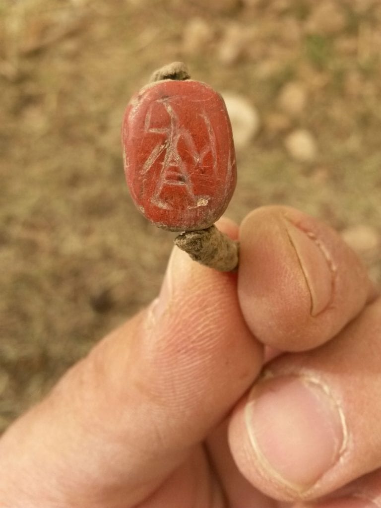 A ring that was discovered in the excavation which is inlaid with a seal depicting an Egyptian warrior holding a shield and sword.(Photo: Unit for the Prevention of Antiquities Robbery of the Israel Antiquities Authority)