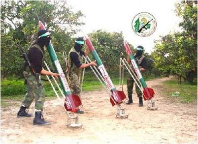 Terrorists in Gaza preparing missiles to fire towards Israel. (Photo: IDF)