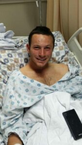 IDF soldier from a Hebron stabbing attack recovers in the hospital. (Photo: Hebron Fund)