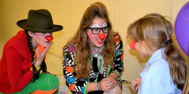 Lev Leytzan medical clowns (at left and center) with a child patient. (Photo: Courtesy Lev Leytzan)