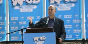 Education Minister Naftali Bennett speaks at the annual conference held by the Yesha Council that represents the Jewish communities of Judea and Samaria, on July 4, 2016. (Photo: Hillel Maeir/TPS)