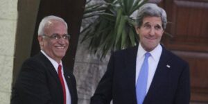 US Secretary of State John Kerry (R) seen with chief Palestinian negotiator Saeb Erekat, prior to Kerry meeting with palestinian president Mahmoud Abbas in the West bank city of Ramallah. April 07, 2013. (Photo: Issam Rimawi/FLASH90)
