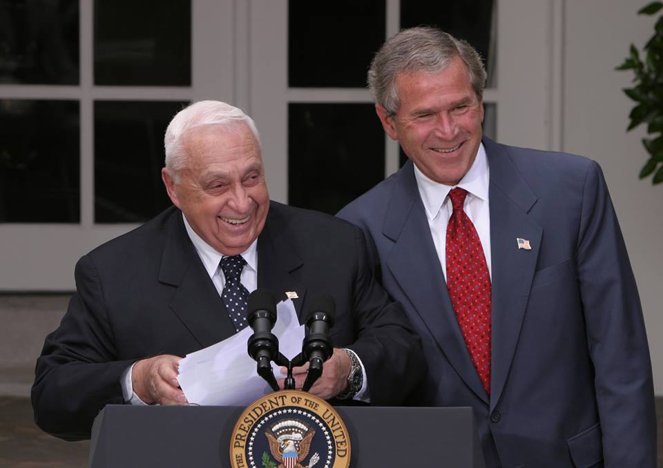Ariel Sharon with George W. Bush. (Photo: Facebook)
