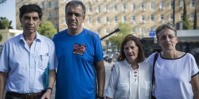 Parents of late Israeli soldiers Oron Shaul and Hadar Goldin speak with the press outside the prime minister's office in Jerusalem after meeting with United Nations Secretary-General Ban Ki-moon and Israeli Prime Minister Benjamin Netanyahu on June 28, 2016. (Photo: Hadas Parush/Flash90)
