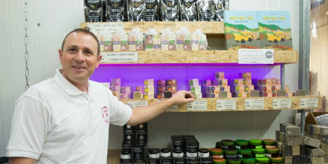 Shlomo Keshet, founder of the Saboneto soap factory in the Binyamin region, who works with Lev HaOlam, an organization that markets packages of products of Judea and Samaria to customers around the world to combat BDS. (Photo: Hillel Maeir/TPS)