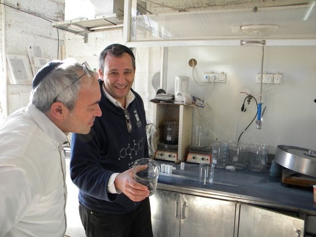 Baruch Sterman (left) and Joel Guberman, two founders of the Ptil Tekhelet non-profit, at the tekhelet factory in Kfar Adumim, Israel. (Photo: Ptil Tekhelet)